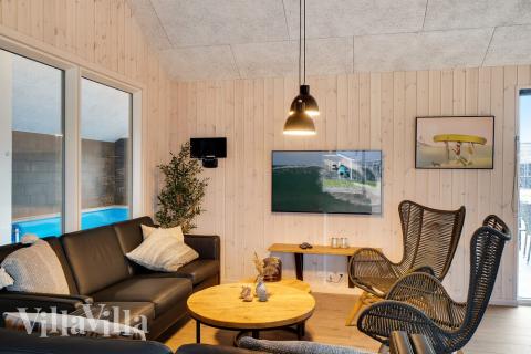 Vardagsrummet i lyxstuga nr. 462 har plats för 26 personer.