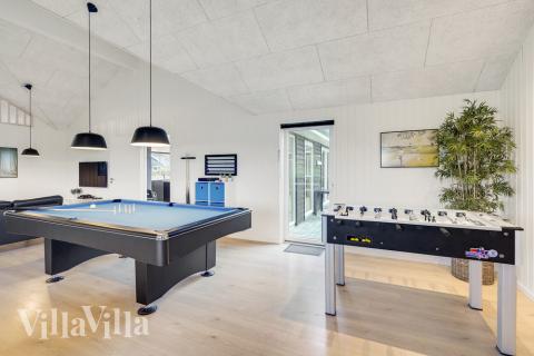 Tävla i sommarhusets aktivitetsrum när ni besöker lyxhus nr 468 i Lolland/Falster/Møn.