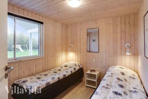 Ett av de 8 utmärkta sovrummen i lyxstuga nr 469 i Lolland/Falster/Møn.