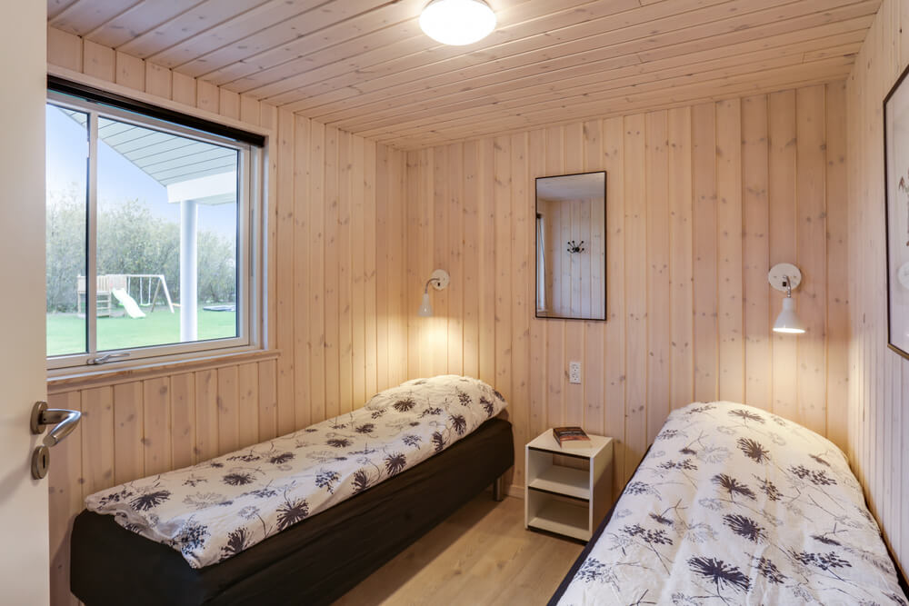 Ett av de 8 utmärkta sovrummen i lyxstuga nr 469 i Lolland/Falster/Møn.