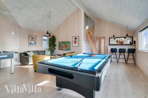 Tävla i sommarhusets aktivitetsrum när ni besöker lyxhus nr 478 i Vestjylland.