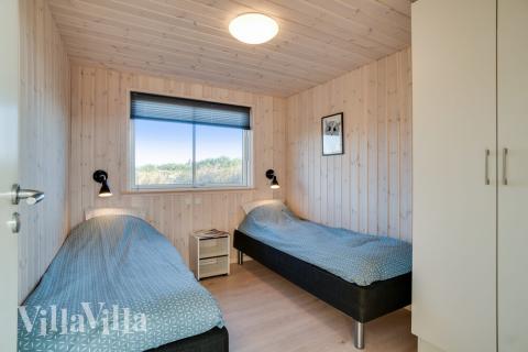Ett av de 7 utmärkta sovrummen i lyxstuga nr 477 i Vestjylland.