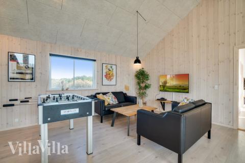 Tävla i sommarhusets aktivitetsrum när ni besöker lyxhus nr 477 i Vestjylland.