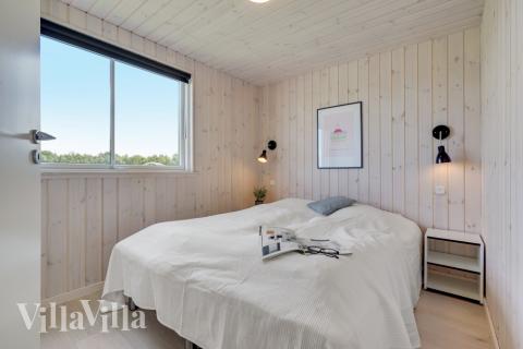 Ett av de 9 utmärkta sovrummen i lyxstuga nr 470 i Lolland/Falster/Møn.