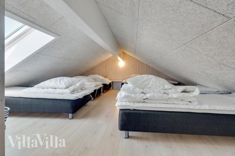 Några av de 24 sovplatserna finns på loftet i lyxstuga nr 470