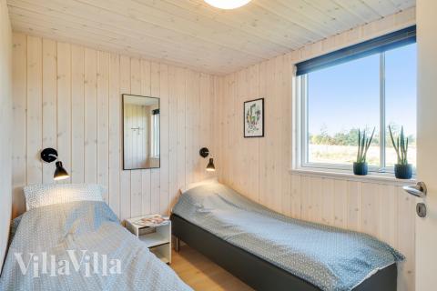 Ett av de 10 utmärkta sovrummen i lyxstuga nr 479 i Østjylland.