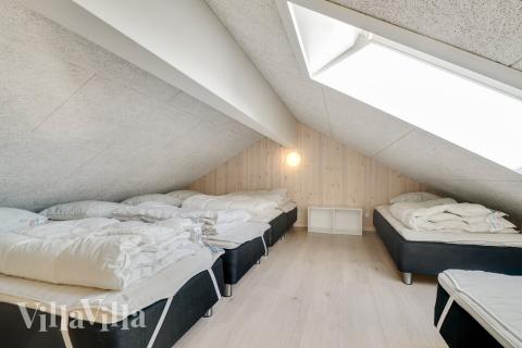 Några av de 26 sovplatserna finns på loftet i lyxstuga nr 479