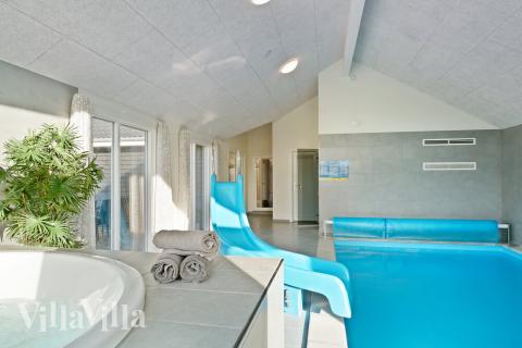 Njut av spabadets värme i lyxstuga nr 479 i Østjylland