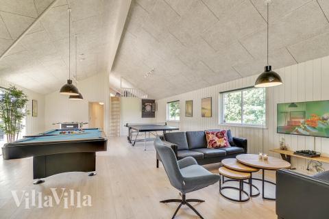 Tävla i sommarhusets aktivitetsrum när ni besöker lyxhus nr 480 i Østjylland.