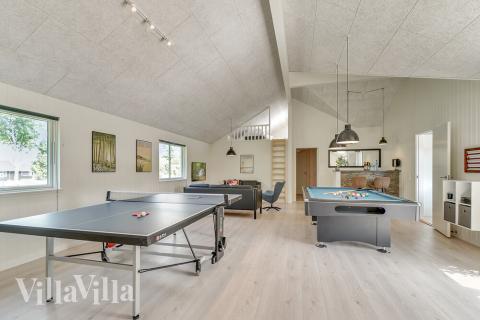 Aktivitetsrum i lyxstuga nr 480 med 9 sovrum och plats för 24 personer.