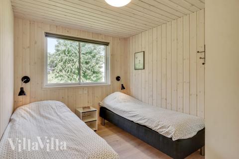Ett av de 9 utmärkta sovrummen i lyxstuga nr 480 i Østjylland.