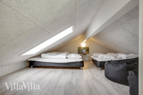 Några av de 18 sovplatserna finns på loftet i lyxstuga nr 489