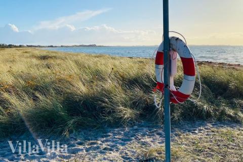 Stranden i närheten av lyxhus 489 i Østjylland bjuder in till en promenad.