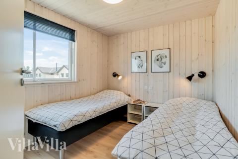 Ett av de 7 utmärkta sovrummen i lyxstuga nr 475 i Vestjylland.