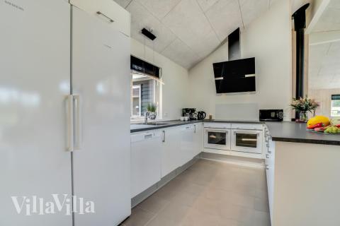 Köket i lyxstuga nr 475 är utrustat så att ni kan laga mat till 18 personer.