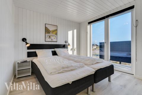 Ett av de 7 utmärkta sovrummen i lyxstuga nr 486 i Vestjylland.