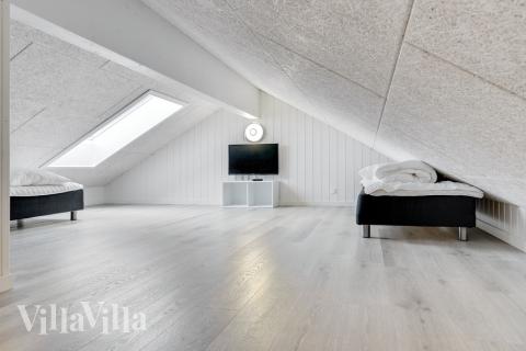 Några av de 20 sovplatserna finns på loftet i lyxstuga nr 486