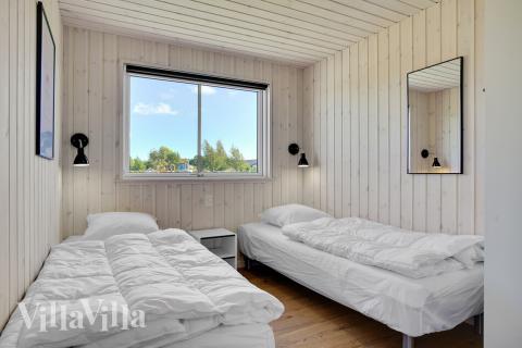 Ett av de 7 utmärkta sovrummen i lyxstuga nr 490 i Lolland/Falster/Møn.