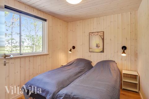 Ett av de 7 utmärkta sovrummen i lyxstuga nr 494 i Nordjylland.