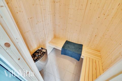 Njut av bastuvärmen i lyxstuga nr 500 för 26 personer