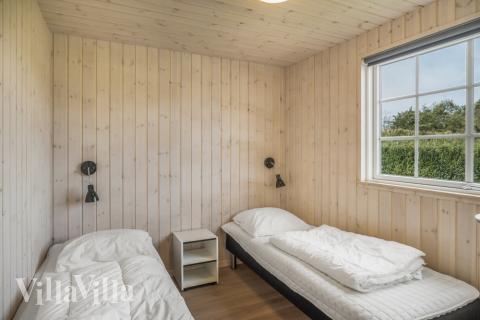 Ett av de 10 utmärkta sovrummen i lyxstuga nr 500 i Nordjylland.