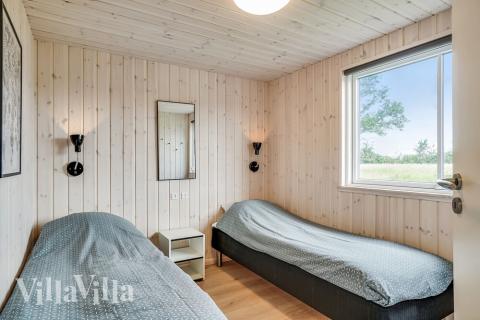 Ett av de 7 utmärkta sovrummen i lyxstuga nr 492 i Østjylland.