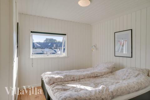 Ett av de 5 utmärkta sovrummen i lyxstuga nr 504 i Nordsjälland.