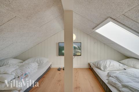 Några av de 14 sovplatserna finns på loftet i lyxstuga nr 504