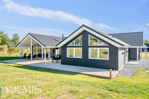 Den tjusiga sommarstugan nr 504 med gott om plats för upp till 14 personer