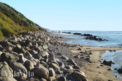 Stranden i närheten av lyxhus 504.