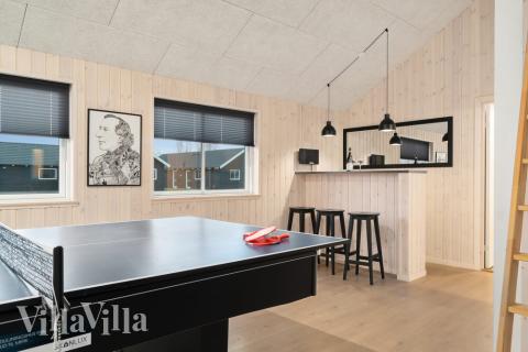 Aktivitetsrum i lyxstuga nr 726 med 7 sovrum och plats för 18 personer.