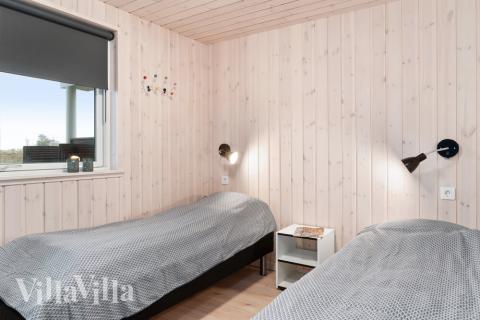 Ett av de 9 utmärkta sovrummen i lyxstuga nr 730 i Tyskland.