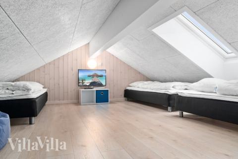 Några av de 24 sovplatserna finns på loftet i lyxstuga nr 730