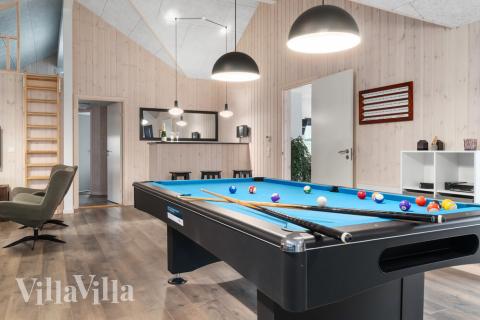 Aktivitetsrum i lyxstuga nr 727 med 9 sovrum och plats för 24 personer.