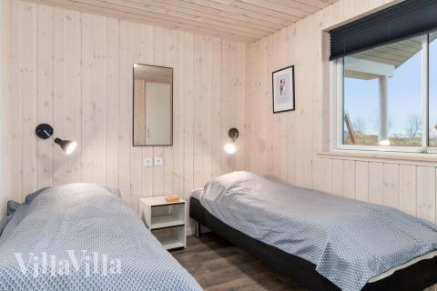 Ett av de 9 utmärkta sovrummen i lyxstuga nr 727 i Tyskland.