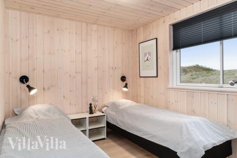 Ett av de 9 utmärkta sovrummen i lyxstuga nr 728 i Tyskland.