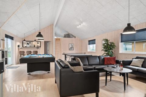 Tävla i sommarhusets aktivitetsrum när ni besöker lyxhus nr 728 i Tyskland.