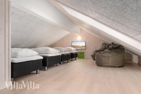 Några av de 18 sovplatserna finns på loftet i lyxstuga nr 733