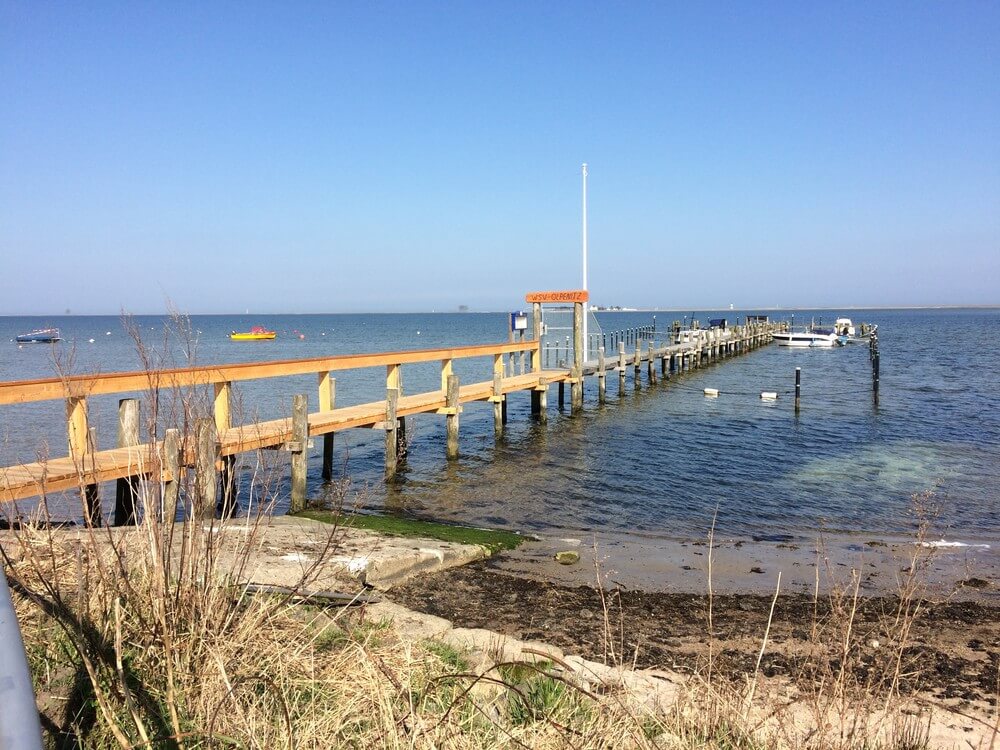Stranden i närheten av lyxhus 731.