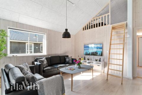 Aktivitetsrum i lyxstuga nr 729 med 9 sovrum och plats för 24 personer.