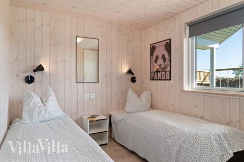 Ett av de 9 utmärkta sovrummen i lyxstuga nr 729 i Tyskland.