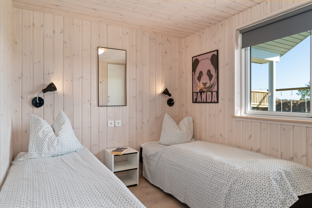 Ett av de 9 utmärkta sovrummen i lyxstuga nr 729 i Tyskland.