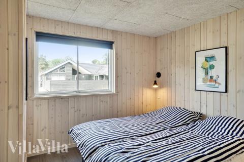 Ett av de 5 utmärkta sovrummen i lyxstuga nr 519 i Lolland/Falster/Møn.