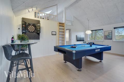 Aktivitetsrum i lyxstuga nr 511 med 5 sovrum och plats för 14 personer.