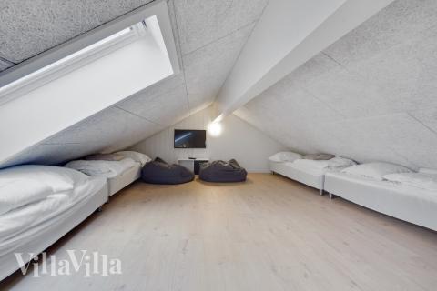 Några av de 14 sovplatserna finns på loftet i lyxstuga nr 511