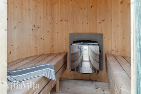 Njut av bastuvärmen i lyxstuga nr 511 för 14 personer