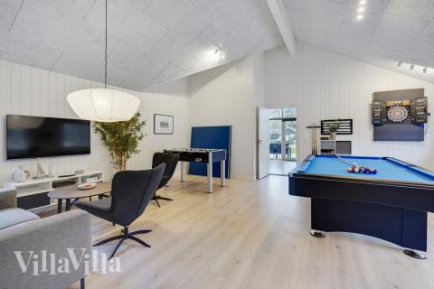 Aktivitetsrum i lyxstuga nr 509 med 6 sovrum och plats för 16 personer.