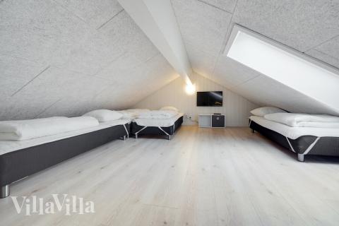 Några av de 16 sovplatserna finns på loftet i lyxstuga nr 509