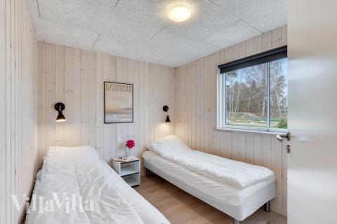 Ett av de 7 utmärkta sovrummen i lyxstuga nr 502 i Lolland/Falster/Møn.