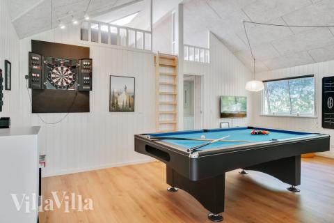 Aktivitetsrum i lyxstuga nr 515 med 5 sovrum och plats för 14 personer.